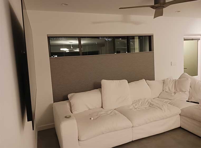 Honeycomb shades on a large, living room window